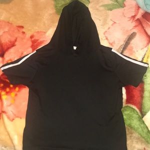 A skin tight black tee